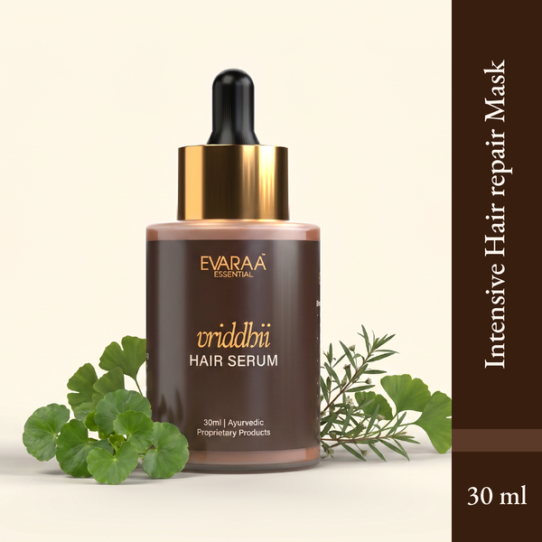 Vriddhii hair serum in a brown glass bottle with a dropper, surrounded by green herbs, 30 ml size